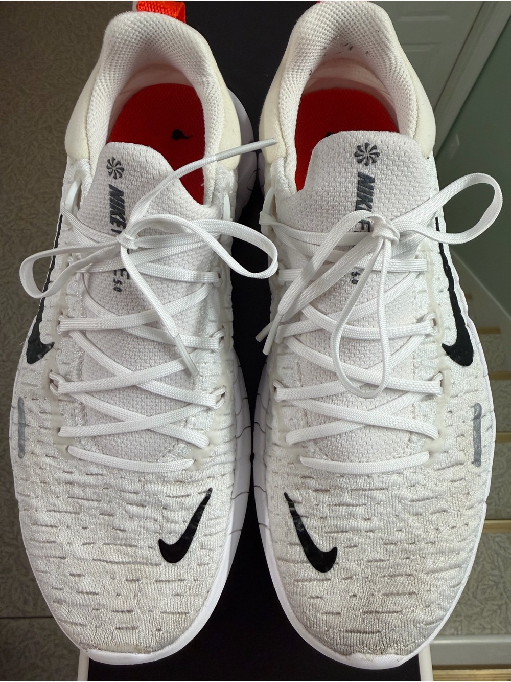 Nike White and Black Women's Athletic Running Shoes with Orange Insole